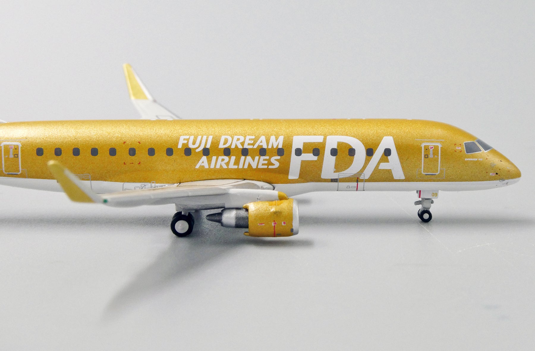 FDA Fuji Dream Airlines Embraer 170-200STD (175STD) JA09FJ 'gold' (EW4175004)