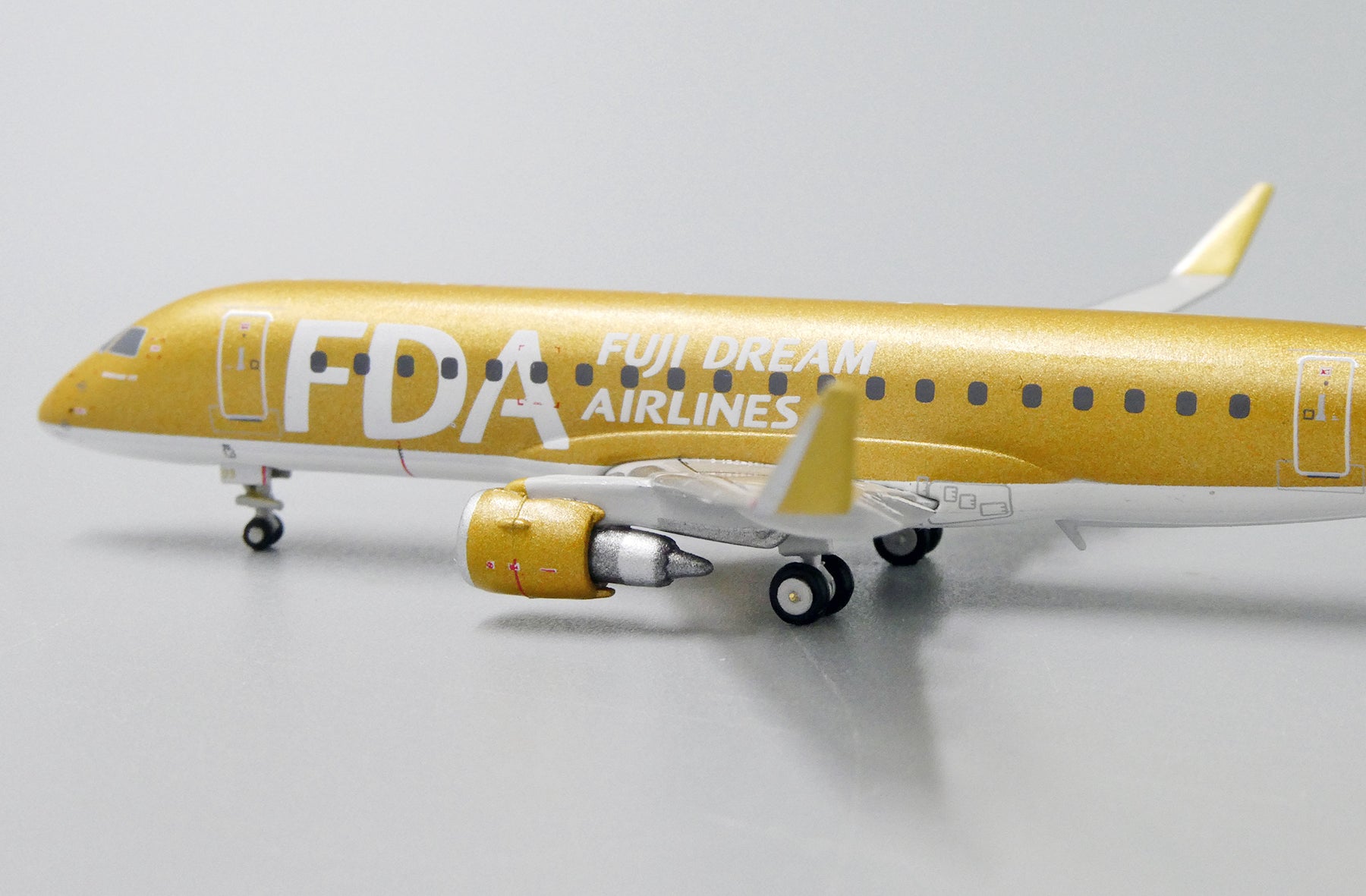 FDA Fuji Dream Airlines Embraer 170-200STD (175STD) JA09FJ 'gold' (EW4175004)