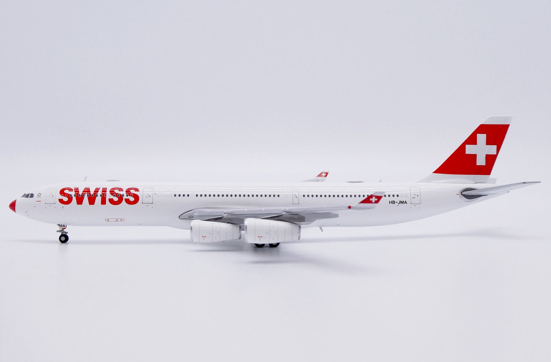 SWISS Airbus A340-300 HB-JMA 'LXmas 2023' (XX40203)